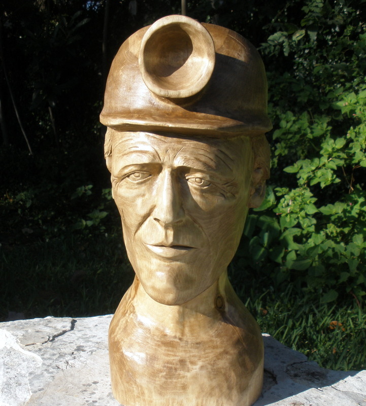 Miner wood carving
